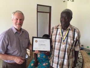 Jim presenting the award to Sebastian